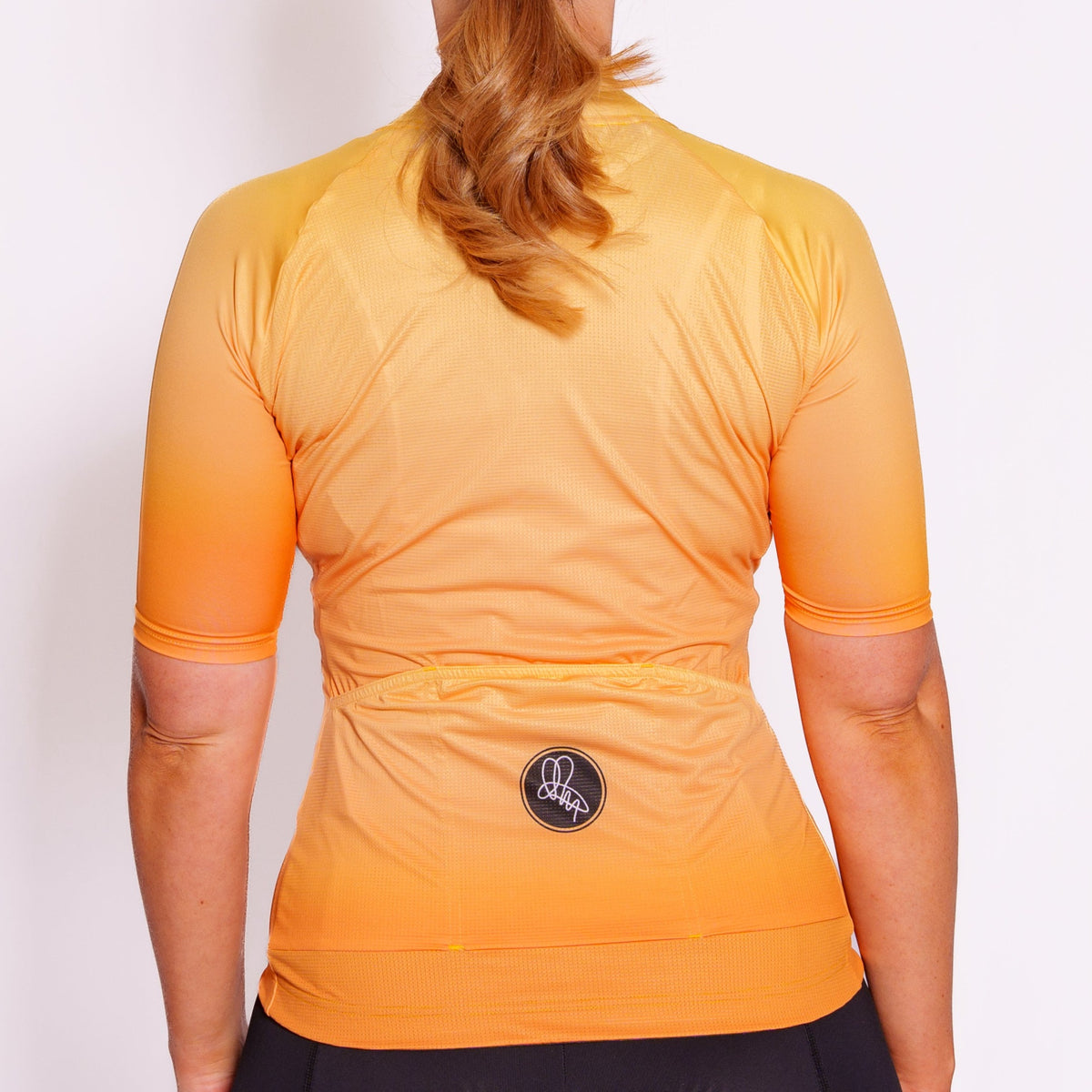 Women's Orange Dissolve Foundation Jersey Attacus Cycling